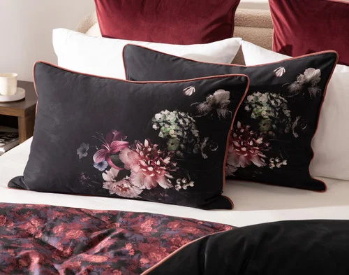Our Valentina Pillow Shams dressing the head of a bed.