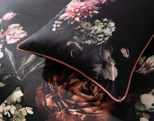 Close up on our Valentina Pillow Sham resting atop our Valentina Duvet Cover.