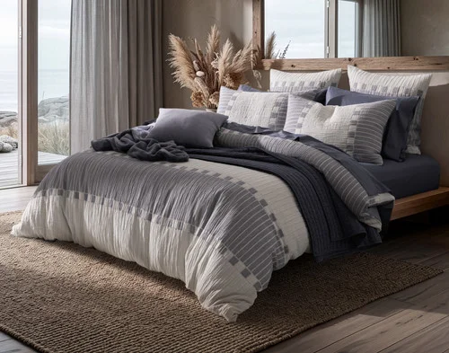 Angled view of our Rocco Duvet Cover dressing a queen bed with the Rocco collection.
