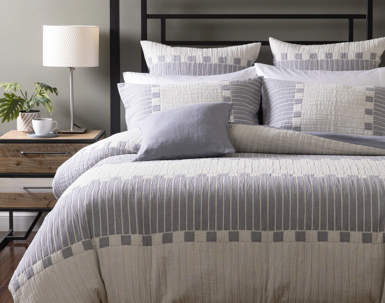 Angled view of our Rocco Duvet Cover dressing a queen bed with the Rocco collection.
