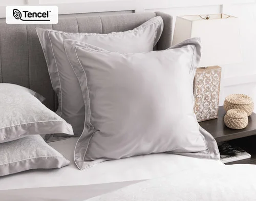 Our Sterling Euro Shams dressing the head of a bed.