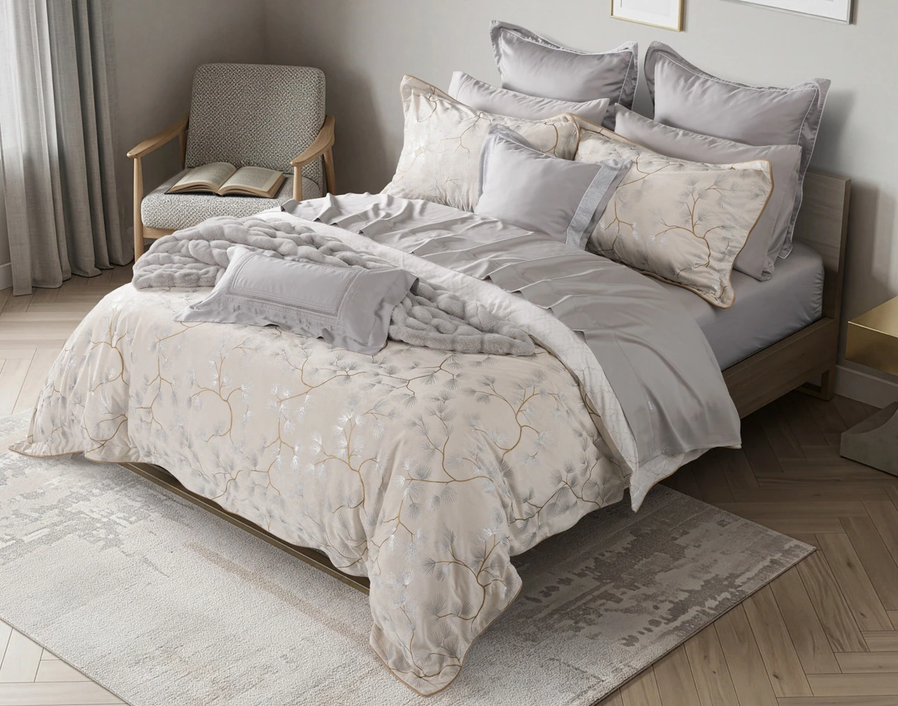 Angled view of our Silverbough Duvet Cover dressed with silver accessories.
