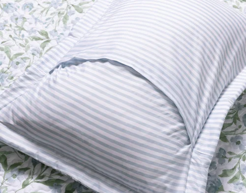 Reverse view of the envelope enclosure of a pillow sham from our Pippa Coverlet Set.