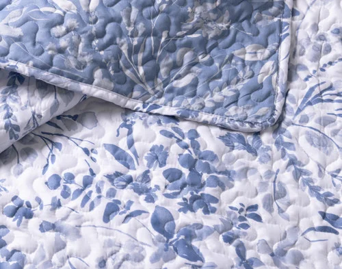 Close-up on a folded corner from our Willa Coverlet Set.