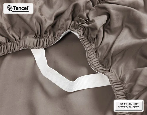 Close-up on the ruffled corner loosely resting on our BeechBliss TENCEL™ Modal Fitted Sheet in Bark.