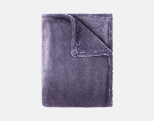 Our Velvet Plush Throw in Violet Smoke folded neatly into a tidy square.