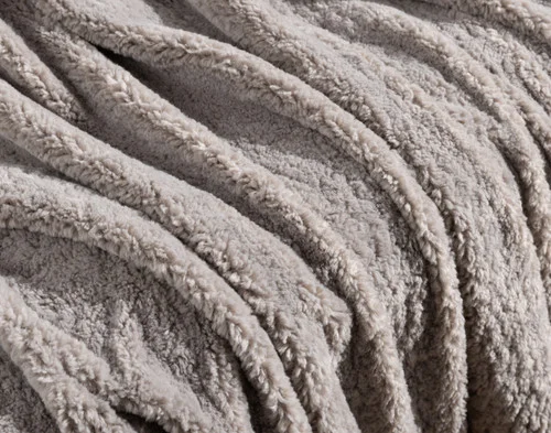 Close-up of the soft surface on our Ashwood Poodle Faux Fur Throw.