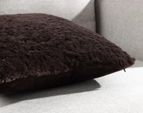 Close-up of the corners and edge on our Espresso Poodle Faux Fur Square Cushion.