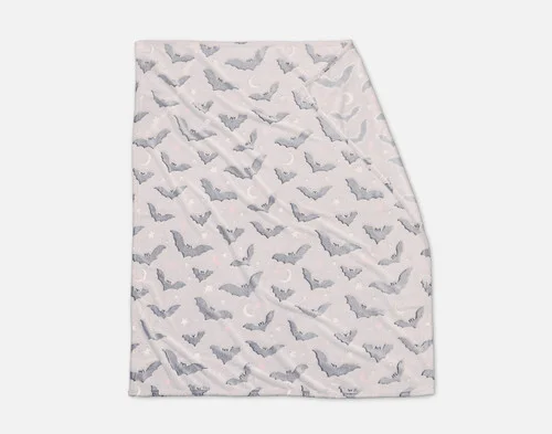 Folded view of our Midnight Bats Glow in the Dark Fleece Throw on a white ground.