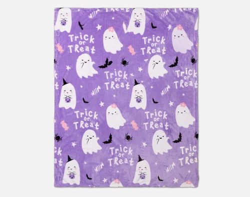 Full view of our Trick or Treat Halloween Fleece Throw over a white ground.