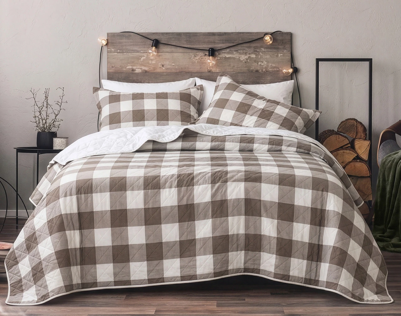 Front view of our Wellington Ash Cotton Quilt Set dressed over a queen bed in a tidy cabin-style bedroom.