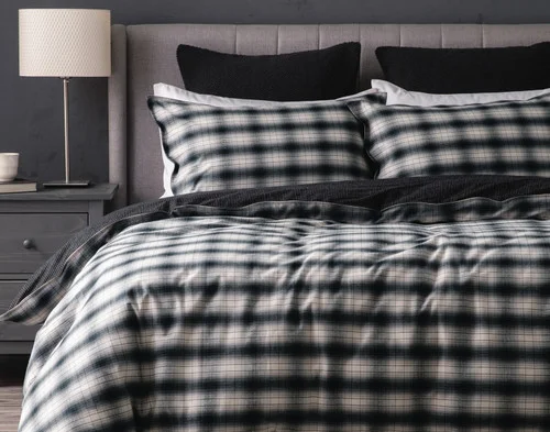 Front, off-centre view of our Bailey Duvet Cover Set dressing a queen bed.