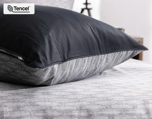 A Metric Pillow Sham resting atop our Metric Duvet Cover.