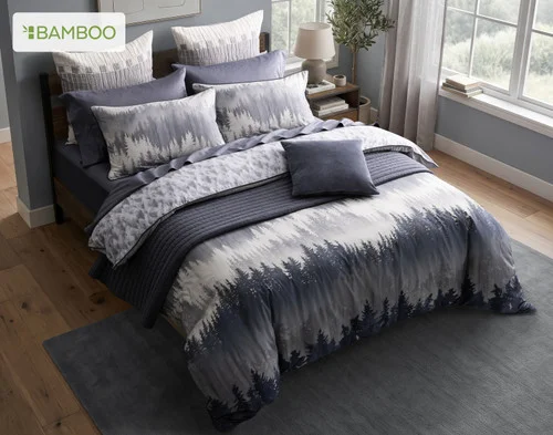 Angled view of our Mountainscape Duvet Cover dressed over a queen bed in a lightly decorated modern bedroom.