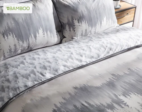 Angled view of our Mountainscape collection dressing the head of a bed.