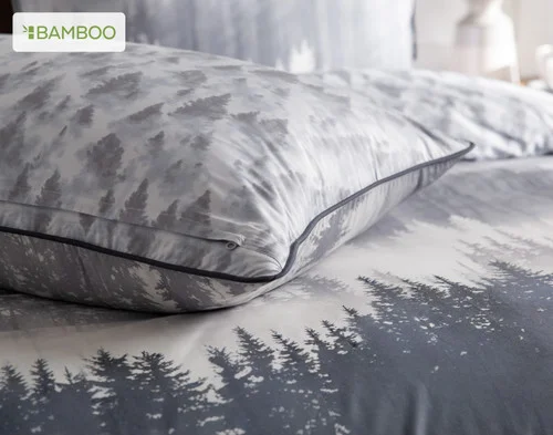Our Mountainscape Pillow Sham resting atop our Mountainscape Duvet Cover.