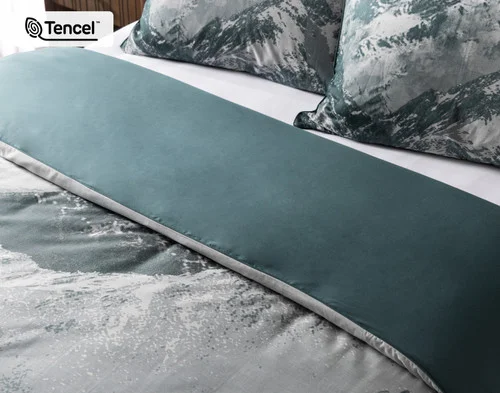 Angled view of our Skyline Duvet Cover dressing the head of a bed.