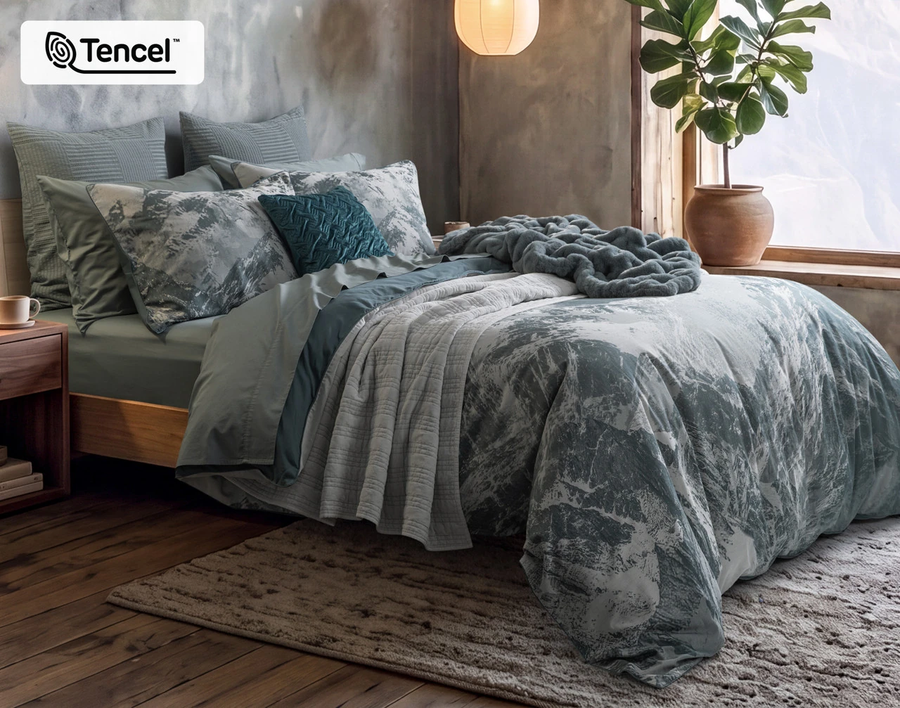 Angled view of our Skyline Duvet Cover dressing a queen bed with accessories.
