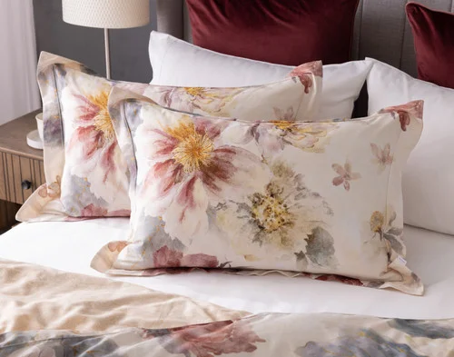 Our Solenna Pillow Shams against the head of a bed.