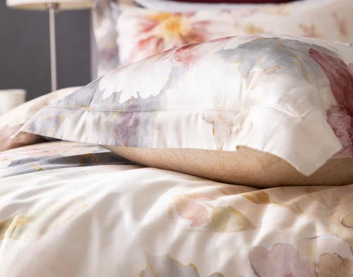 Our Solenna Pillow Sham resting on our Solenna Duvet Cover.
