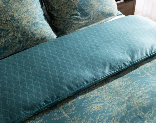 Angled view of our Elwood Duvet Cover dressing the head of a bed.