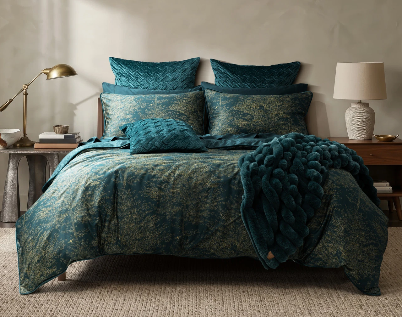 Front view of our Elwood Duvet Cover dressing a queen bed with accessories.