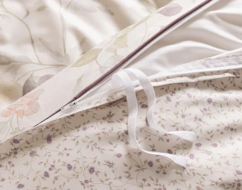 Close up on the zippered edge of our Elodie Duvet Cover.