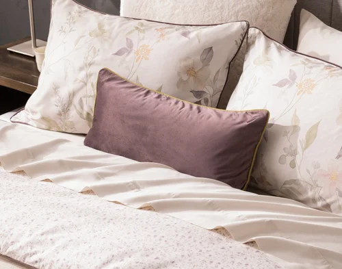 Our Elodie accessories dressing the head of a bed.