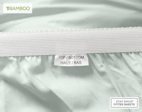 The Top/Bottom tag on our Bamboo Cotton Fitted Sheet in Aqua Smoke.