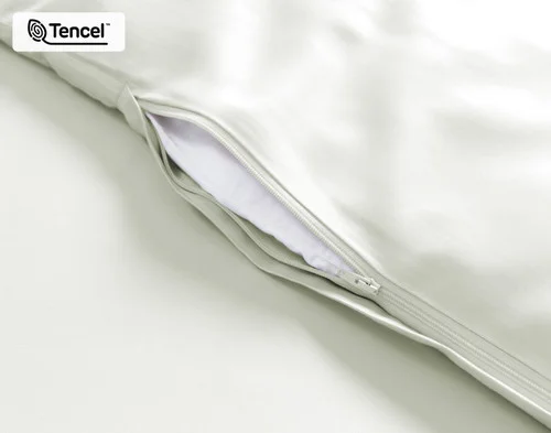 Close-up on the zipper enclosure from our Oyster Eucalyptus Luxe Duvet Cover.
