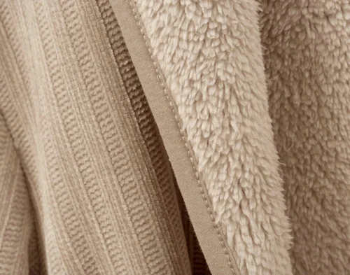 Close-up of the fabric on our Chenille Sherpa Bathrobe in Dune to show both its sherpa lining and chenille surface.
