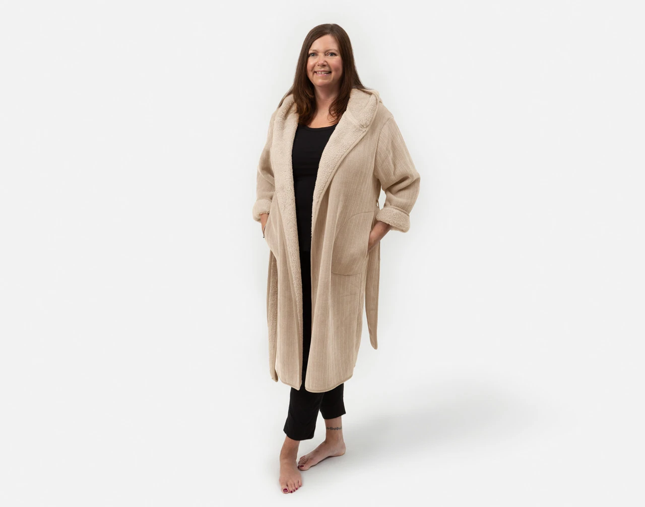 Front view of woman wearing our Chenille Sherpa Bathrobe in Dune against a solid white background.