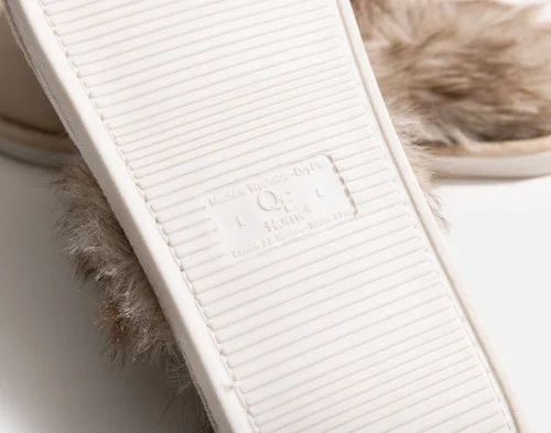 Rubber sole on the bottom of our Faux Fur Plush Slippers in Dune.