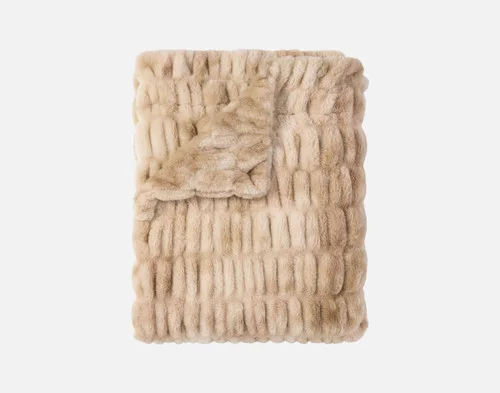 Our Cocoon Plush Throw in Caramel folded into a rectangle against a white background.