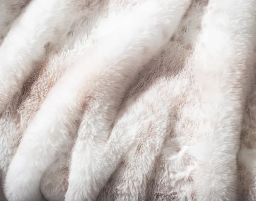 Close up on the fluffy surface of our Animal Faux Fur Throw - Snow Leopard.