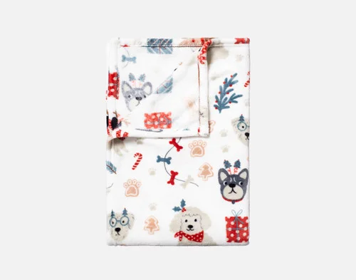 Our Holiday Fleece Throw - Cozy Canines folded into a rectangle against a white background.