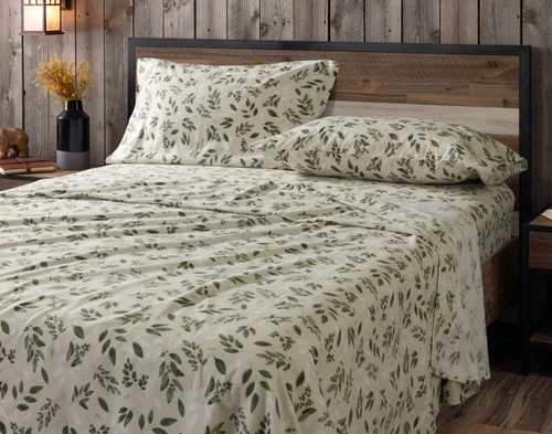 Our Woodmere Organic Cotton Flannel Sheet Set dressed over a plain queen bed.