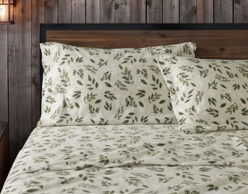 Front view of two pillowcases from our Woodmere Organic Cotton Flannel Sheet Set resting against a headboard.