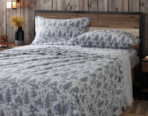 Our Winter Toile Organic Cotton Flannel Sheet Set dressed over a plain queen bed.