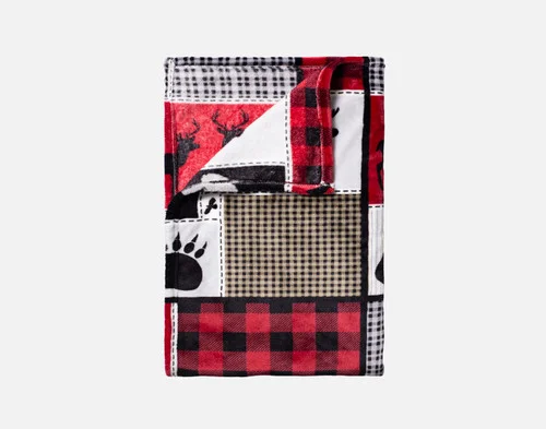 Our Holiday Fleece Throw - Cabin Comfort folded into a rectangle against a white background.