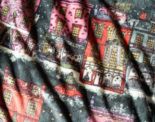 Close up on our Holiday Fleece Throw - Festive Grove.