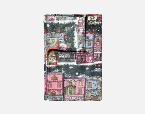 Our Holiday Fleece Throw - Festive Grove folded into a rectangle against a white background.