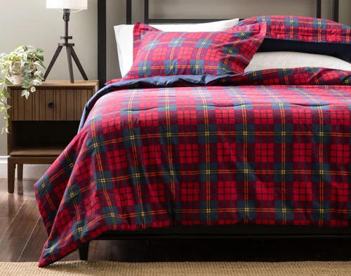Front view of our Bramble Ridge Cotton Flannel Comforter Set dressed on a cabin-style queen bed.