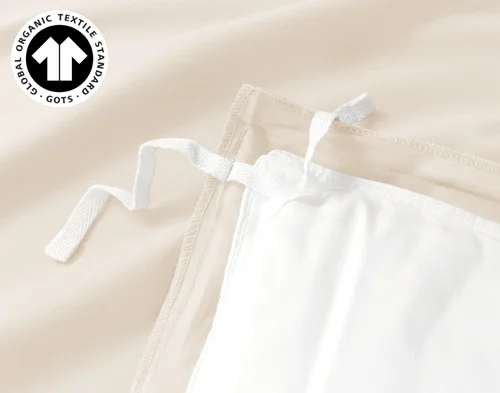 Corner ties on the inside of our Undyed & Unbleached Organic Cotton Duvet Cover.