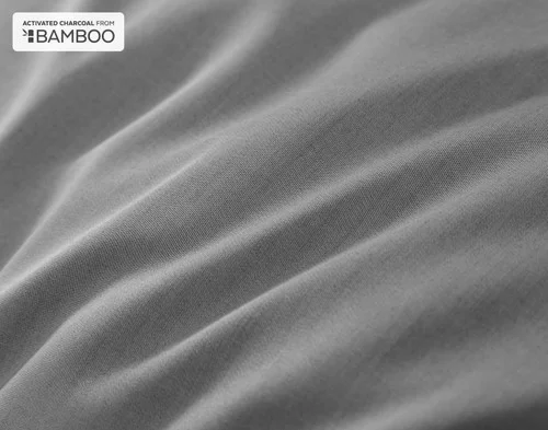 Close-up of the deep grey colour and bamboo cotton surface with activated charcoal on our Deep Charcoal Bamboo Cotton Duvet Cover.