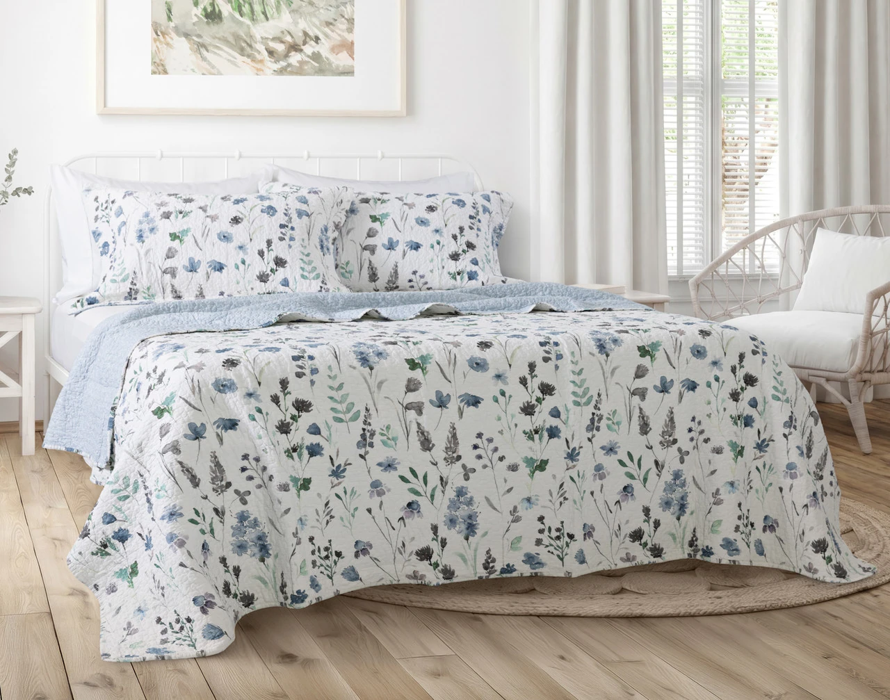 Front view of our Linnea Cotton Quilt Set in a brightly lit bedroom.