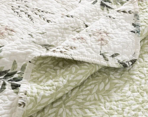 Close-up of the surface and reverse on the corner of our Fairfield Cotton Quilt Set.