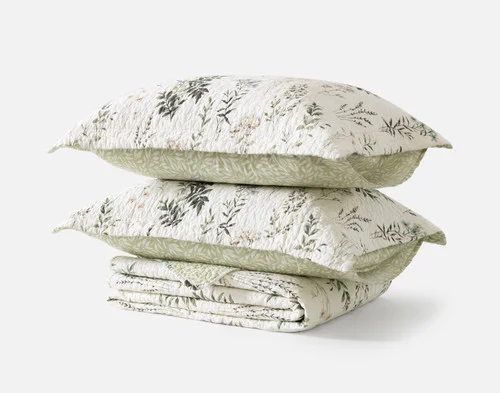 The contents of our Fairfield Cotton Quilt Set resting in a neat stack.