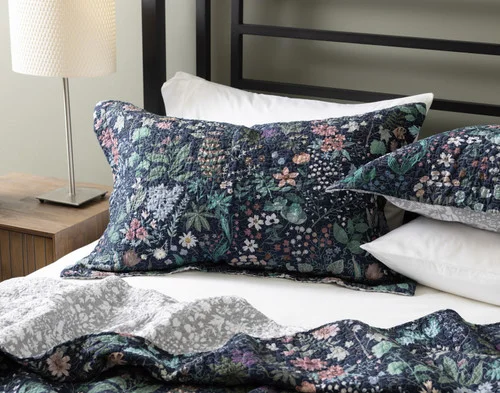 Our Sydney Cotton Quilt Set dressing the head of a bed.
