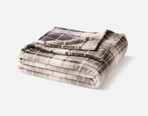 Our Pine Plaid Blanket folded neatly into a square.